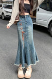 Upgrade your Y2K Whimsigoth Aesthetic with this High Waist Irregular Style Mermaid Denim Skirt. The ultimate essential for Korean streetwear outfits, asymmetric fishtail maxi skirt trends, and dramatic denim lookbooks. Featuring a flattering snatched high-rise waist and a cascading ruffled wave hem, this long jean skirt is a must-have for your Aesthetic Skirts