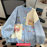 Children's cardigan with cat patterns on a chair, brand 'nadooutfitland' visible