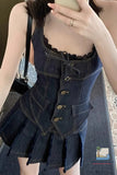 Person wearing a denim dress with lace details and buttons.