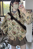 Person wearing a floral jacket and plaid skirt indoors.
