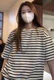 Upgrade your 90s Minimalist Aesthetic with this Loose Short Sleeve O-Neck Classic Colors Shirt. The ultimate essential for Normcore everyday outfits, heavy-weight boxy crewneck tee trends, and effortless minimalist capsule lookbooks. Featuring a flattering loose fit and a premium structured neckline, this classic neutral shirt is a must-have for your Basics Wardrobe or Streetwear Inspo