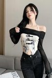 Woman wearing a black and white outfit with a blurred background