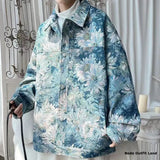 Person wearing a floral patterned jacket in a neutral setting