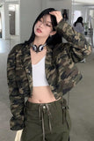 Person wearing a camouflage jacket and green pants in an indoor setting