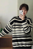 Upgrade your 90s Grunge Aesthetic with this Long Sleeve Retro Contrast Striped Knitted Sweater. The ultimate essential for Grandpa-Core outfits, chunky colorful knitwear trends, and cozy everyday autumn lookbooks. Featuring a flattering relaxed drape and a classic horizontal contrast stripe layout, this pullover sweater is a must-have for your Aesthetic Sweaters or Retro Clothing collection.
