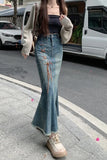 Upgrade your Y2K Whimsigoth Aesthetic with this High Waist Irregular Style Mermaid Denim Skirt. The ultimate essential for Korean streetwear outfits, asymmetric fishtail maxi skirt trends, and dramatic denim lookbooks. Featuring a flattering snatched high-rise waist and a cascading ruffled wave hem, this long jean skirt is a must-have for your Aesthetic Skirts