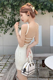 Level up your Summer Aesthetic with this Backless Knitted Mini Dress. The perfect essential for Vacation Outfits, Baddie-core styles, and "European Summer" mood boards. Featuring a stunning open-back design and a flattering bodycon knit, this sexy mini dress is a must-have for your Beach Club or Night Out collection.