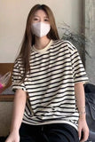 Upgrade your 90s Minimalist Aesthetic with this Loose Short Sleeve O-Neck Classic Colors Shirt. The ultimate essential for Normcore everyday outfits, heavy-weight boxy crewneck tee trends, and effortless minimalist capsule lookbooks. Featuring a flattering loose fit and a premium structured neckline, this classic neutral shirt is a must-have for your Basics Wardrobe or Streetwear Inspo