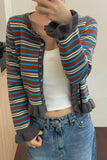 Level up your Coquette Aesthetic with this Striped Cropped Ruffles Cardigan. The perfect choice for Soft Girl outfits, French-chic styles, and "ballet-core" inspired looks. Featuring a flattering cropped fit and adorable ruffle details, this striped sweater is a must-have for your Aesthetic Outfits mood board.