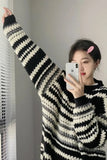 Upgrade your 90s Grunge Aesthetic with this Long Sleeve Retro Contrast Striped Knitted Sweater. The ultimate essential for Grandpa-Core outfits, chunky colorful knitwear trends, and cozy everyday autumn lookbooks. Featuring a flattering relaxed drape and a classic horizontal contrast stripe layout, this pullover sweater is a must-have for your Aesthetic Sweaters or Retro Clothing collection.