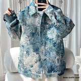Floral patterned jacket on a chair with a neutral background