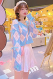 Woman wearing a blue and pink checkered cardigan in a store setting