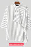 White and gray striped shirt on a hanger with a visible brand logo.