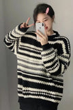 Upgrade your 90s Grunge Aesthetic with this Long Sleeve Retro Contrast Striped Knitted Sweater. The ultimate essential for Grandpa-Core outfits, chunky colorful knitwear trends, and cozy everyday autumn lookbooks. Featuring a flattering relaxed drape and a classic horizontal contrast stripe layout, this pullover sweater is a must-have for your Aesthetic Sweaters or Retro Clothing collection.