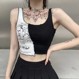 Person wearing a black sleeveless top with floral design and text, standing against a neutral background.