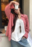 Upgrade your 90s Grunge Aesthetic with this Long Sleeve Classic Red Plaid Blouse Shirt. The ultimate essential for Americana everyday outfits, oversized red checkered flannel trends, and cozy autumn layering lookbooks. Featuring a flattering relaxed drape and a timeless tartan pattern, this versatile top is a must-have for your Button Up Shirts or Vintage Clothing collection.