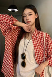 Upgrade your 90s Grunge Aesthetic with this Long Sleeve Classic Red Plaid Blouse Shirt. The ultimate essential for Americana everyday outfits, oversized red checkered flannel trends, and cozy autumn layering lookbooks. Featuring a flattering relaxed drape and a timeless tartan pattern, this versatile top is a must-have for your Button Up Shirts or Vintage Clothing collection.